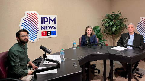 three people at podcast studio