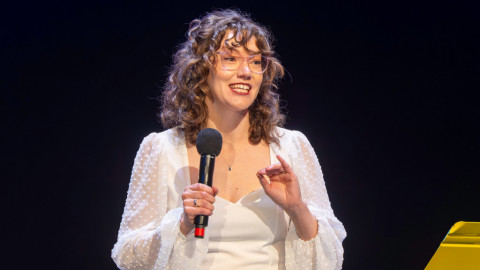 Monica Bullington gestures mid-story