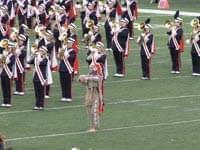 Chief Illiniwek with marching band